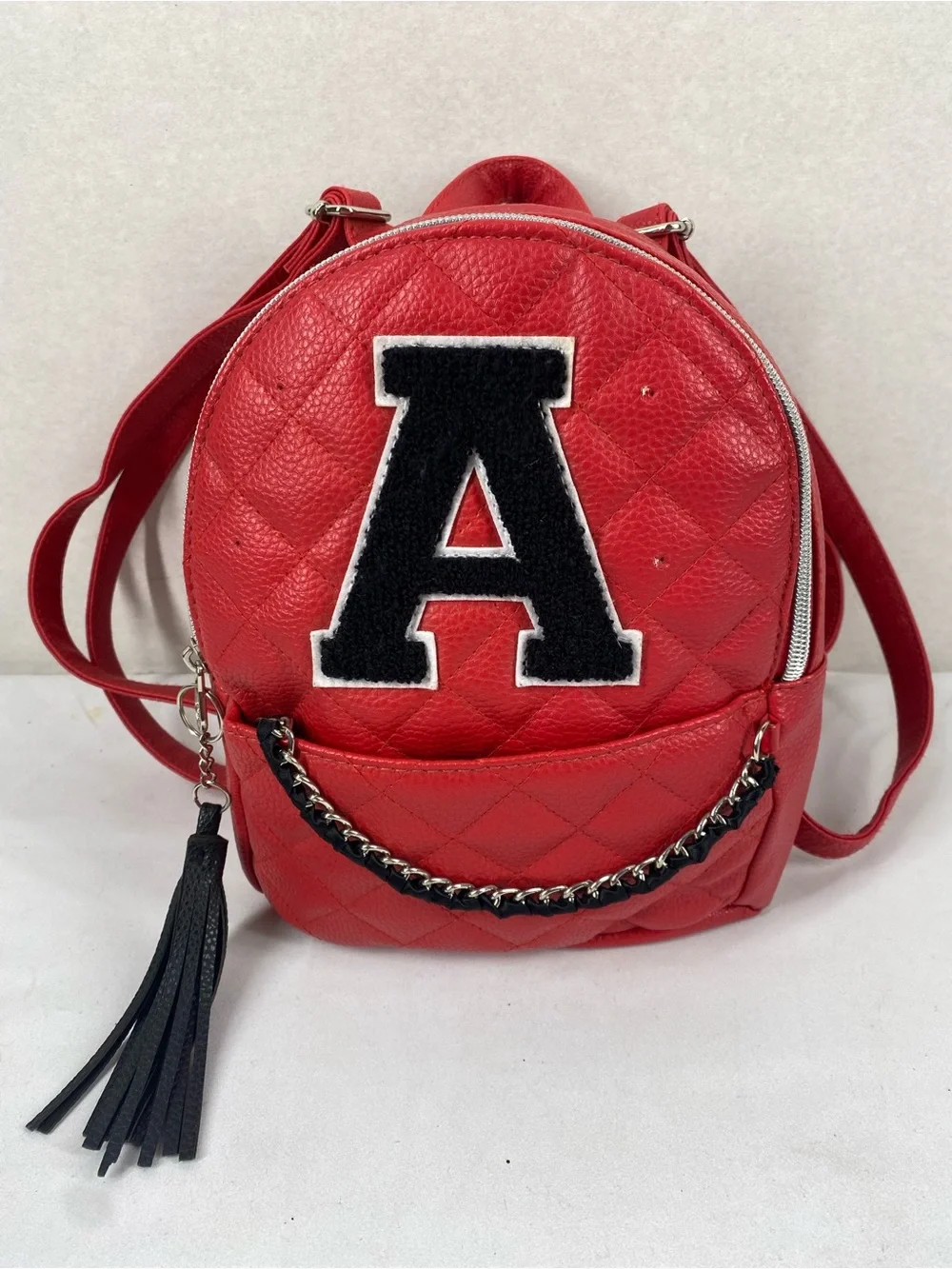 Justice Red Quilted Mini Backpack with Black Patch